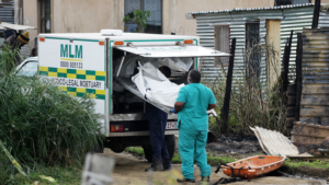 An-emergency-worker-loading-a-body